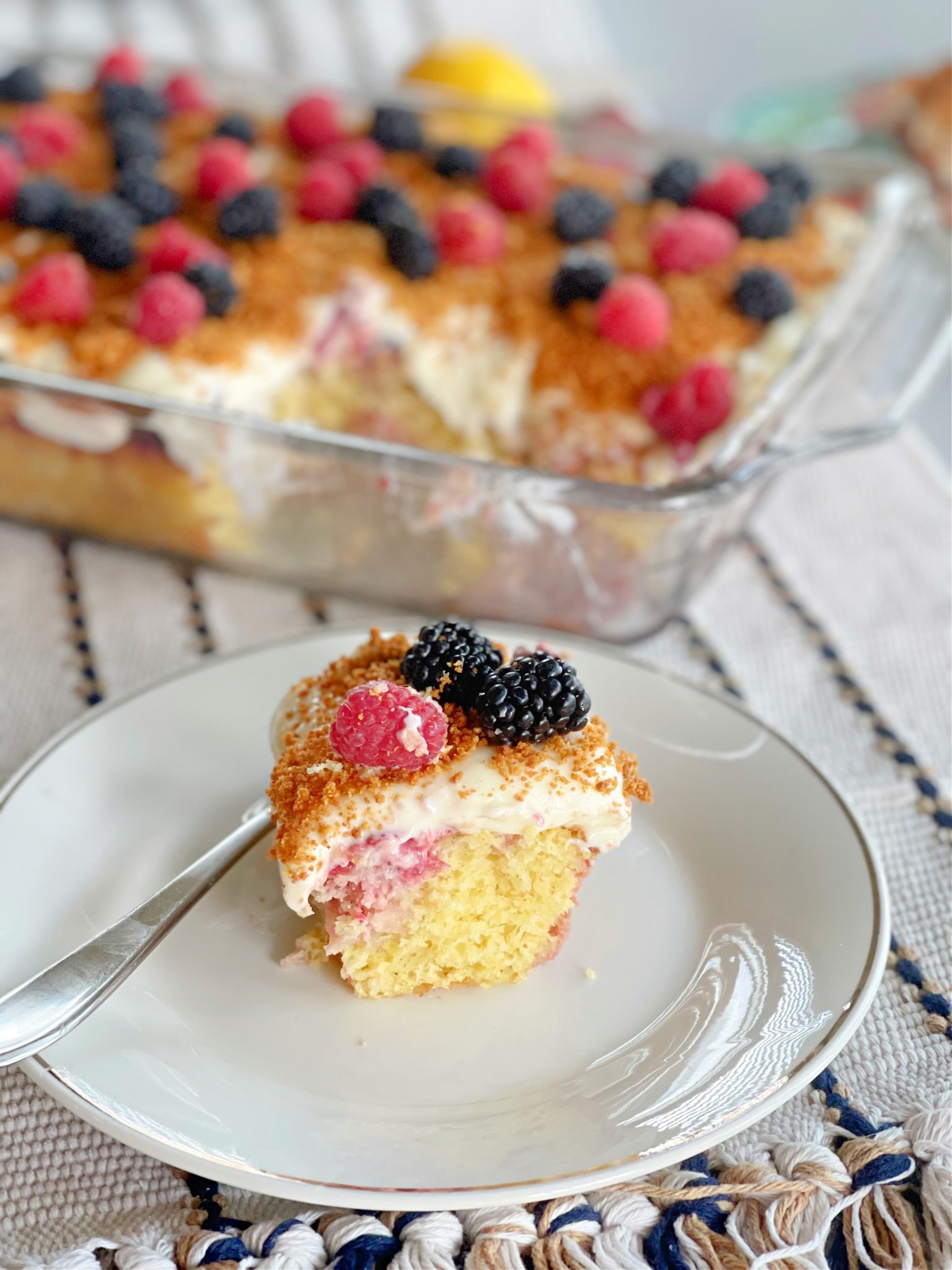 Delicious Triple Berry Poke Cake - Lou Lou Girls