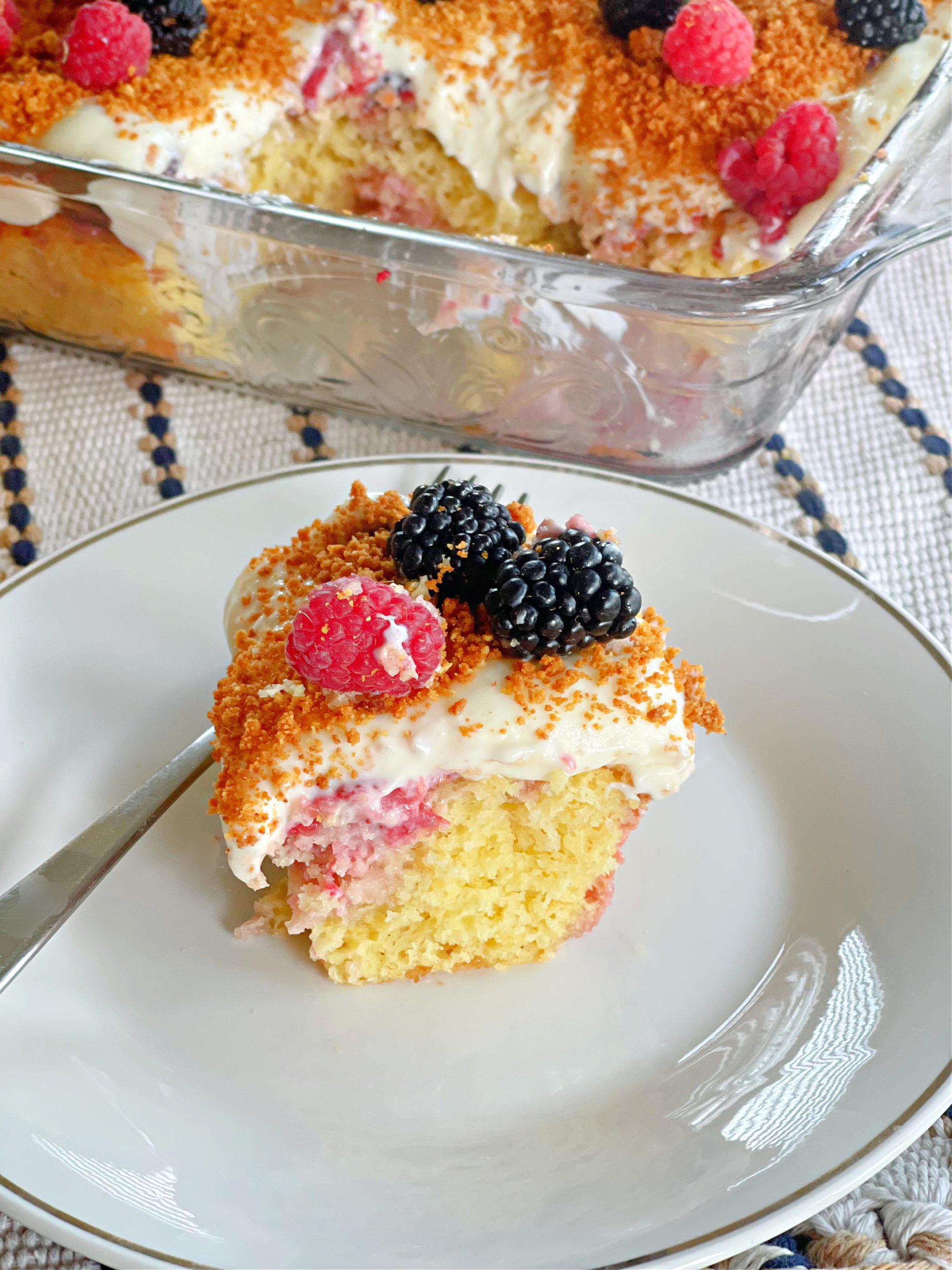 Delicious Triple Berry Poke Cake - Lou Lou Girls